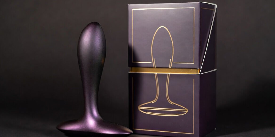 Premium custom packaging for a sleek silicone dildo with elegant minimalist luxury box design