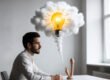 From idea to adult toy prototype: Inventor with lightbulb thought bubble and physical product on desk