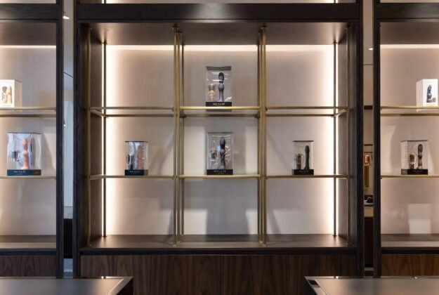 "Elegant shelves displaying adult toys in a retail adult toy store showcasing diverse product collections
